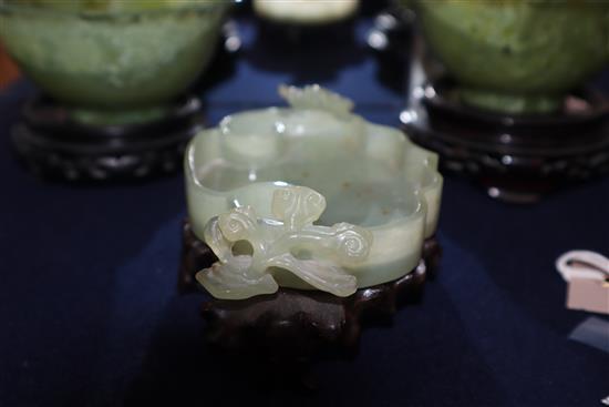 A Chinese bowenite jade brushwasher and a pair of hardstone bowls